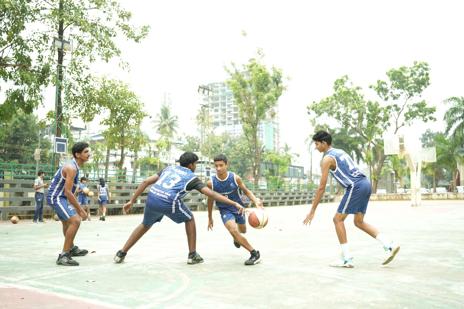 Devamatha students playing basketball