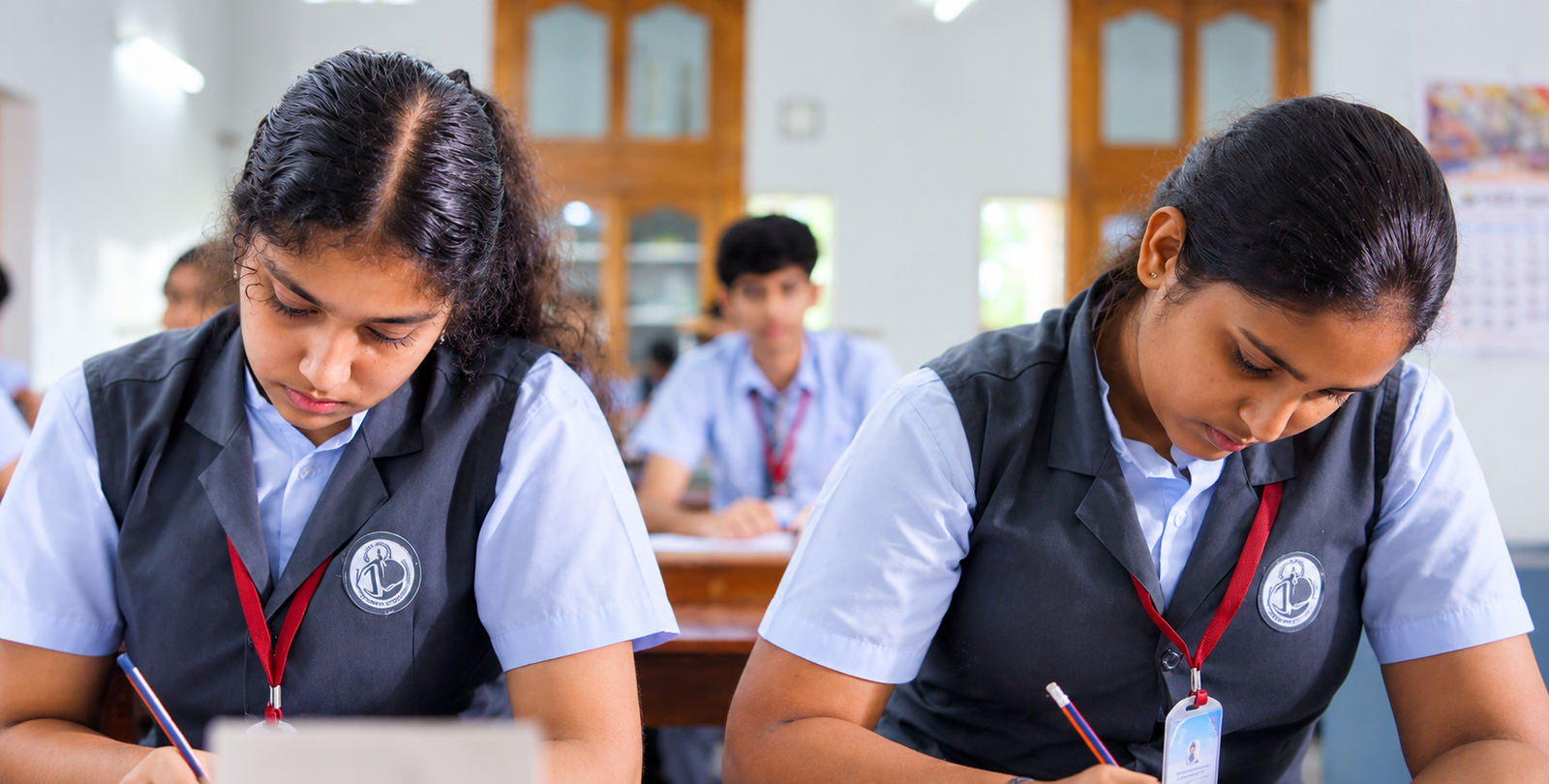 Devamatha students focused on their classroom work