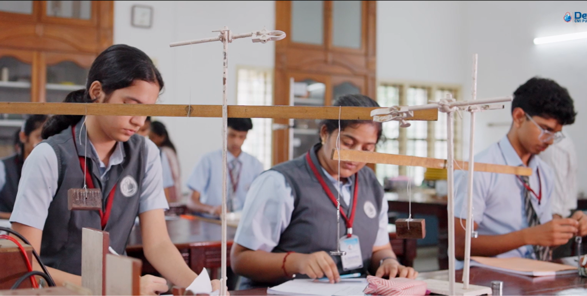 Students conducting a physics experiment in the laboratory