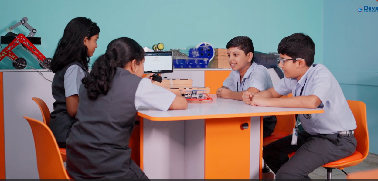 Students working together in a robotics learning space